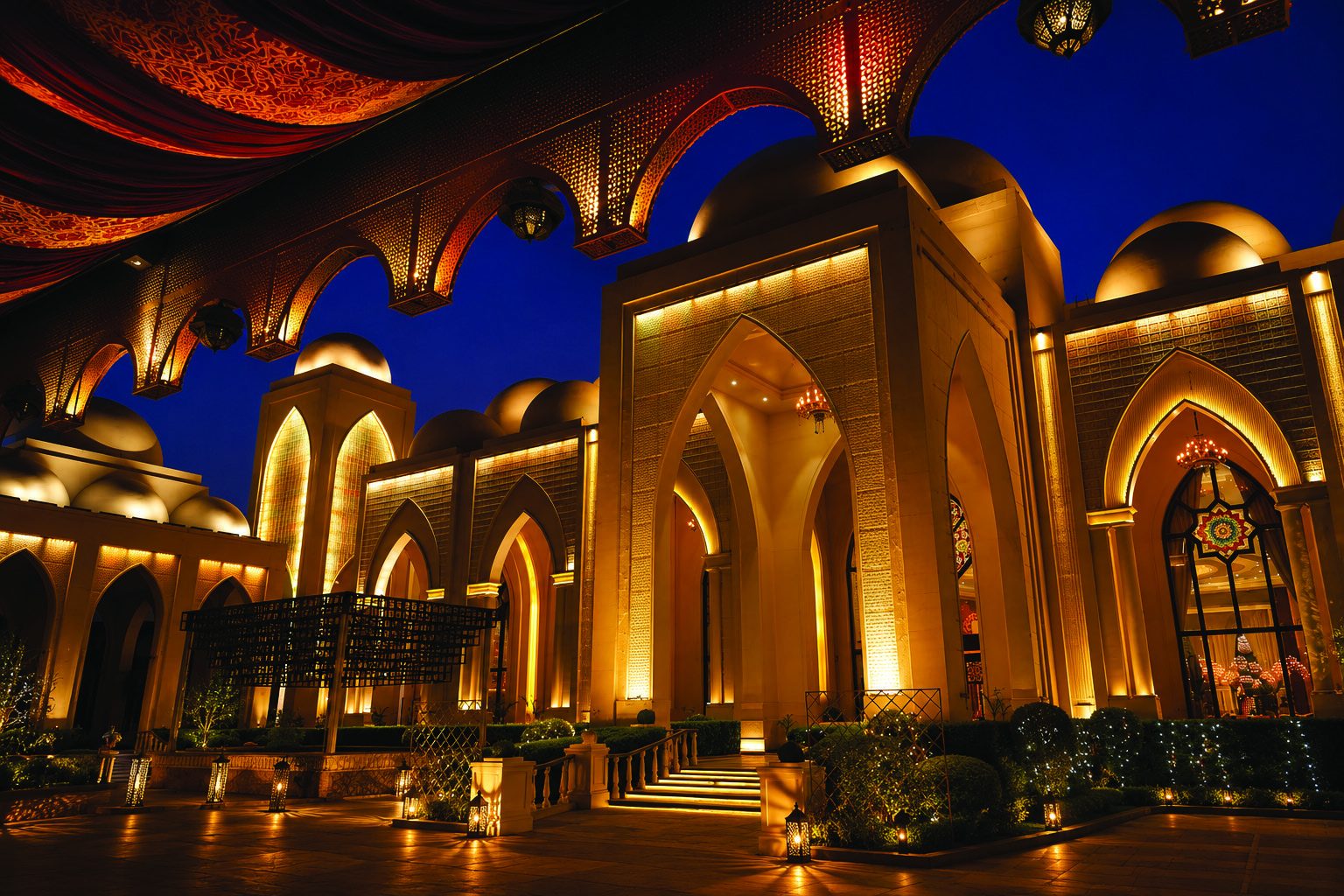 The Palace illuminated at dusk